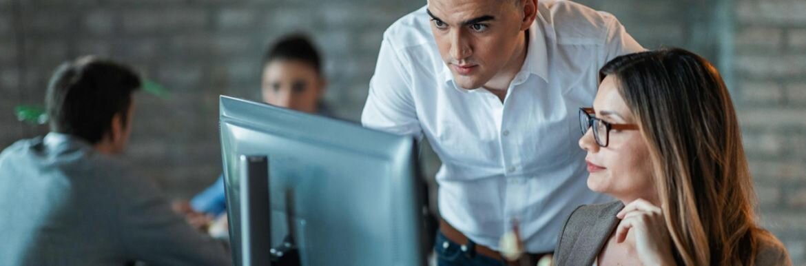 IT Professionals looking a a screen